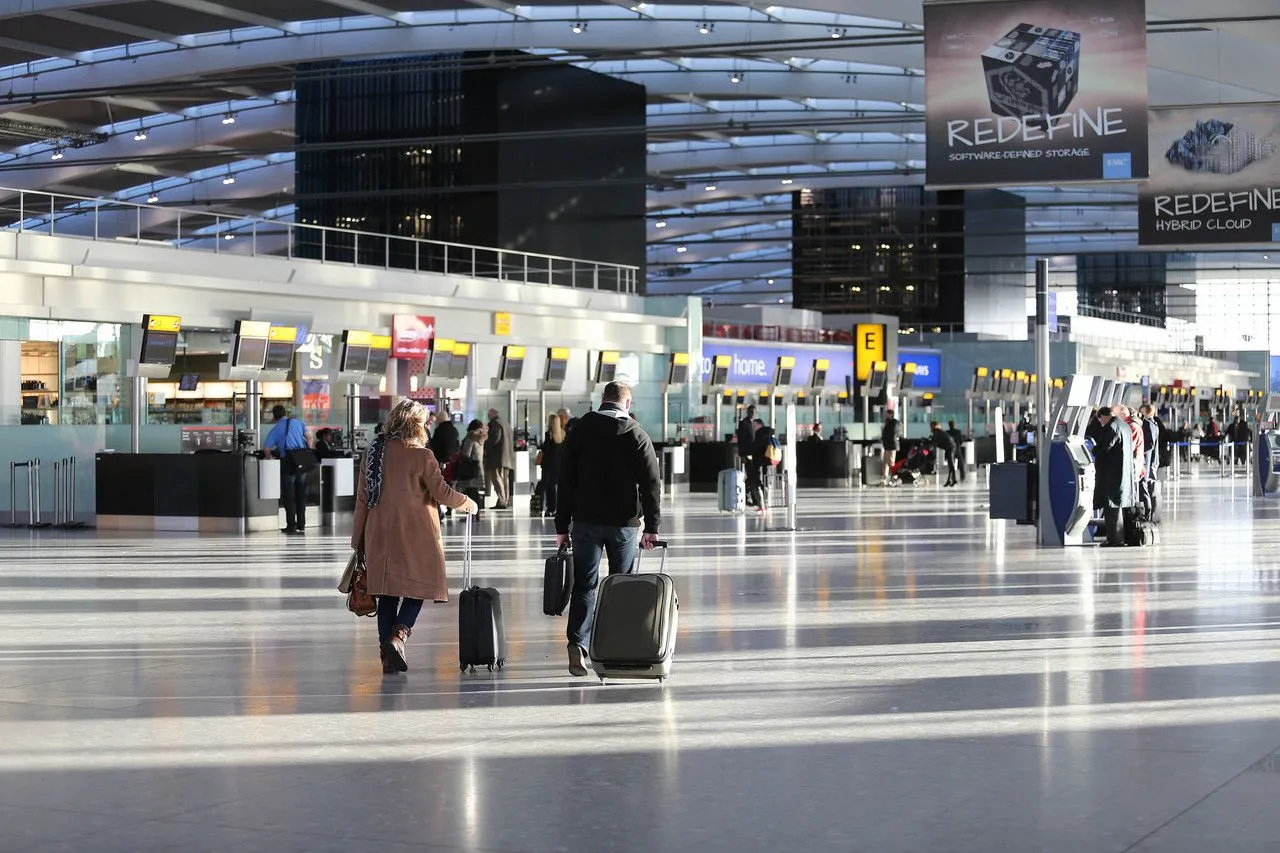 Interior view of London Heathrow Airport terminal arrivals hall concourse